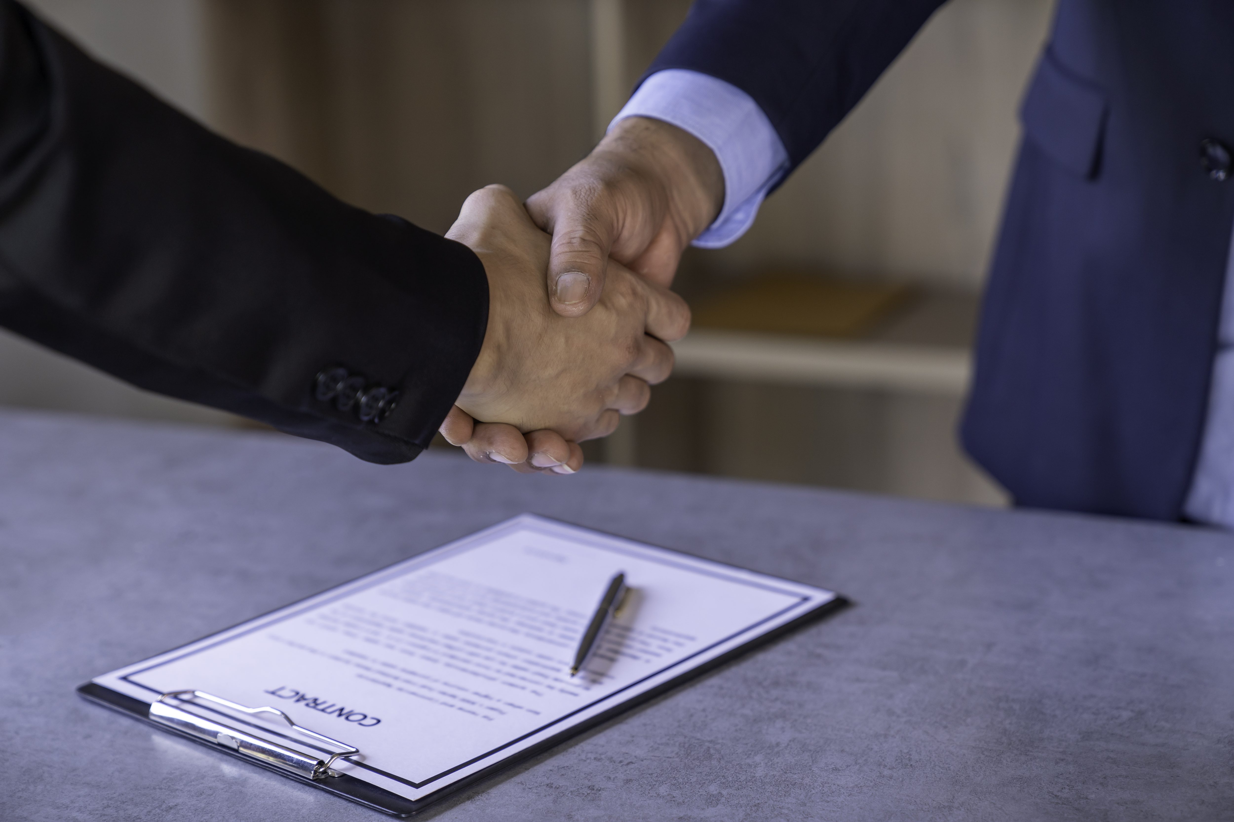 Business handshake at office