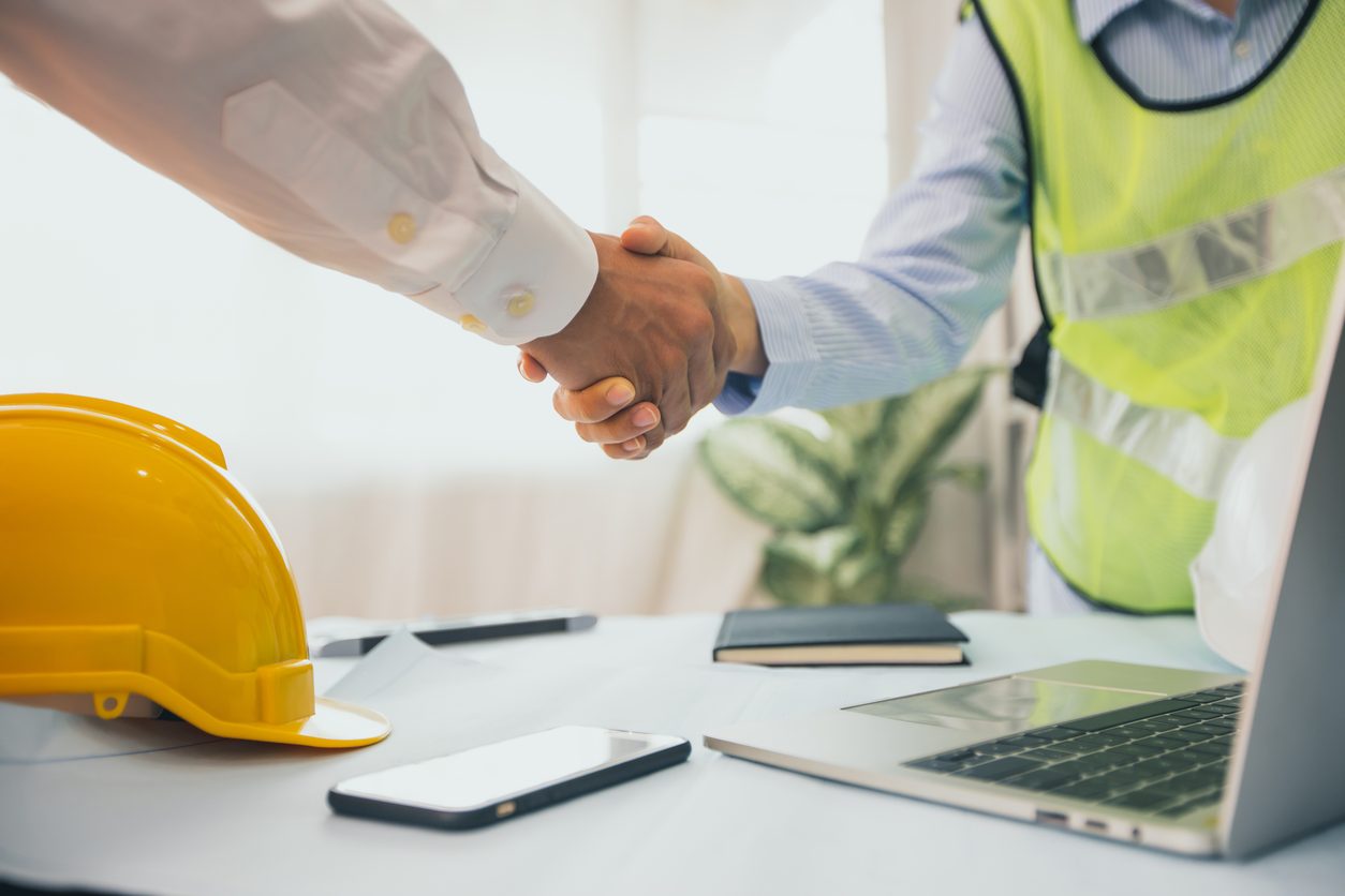 Public adjuster consulting with a couple and answering their questions