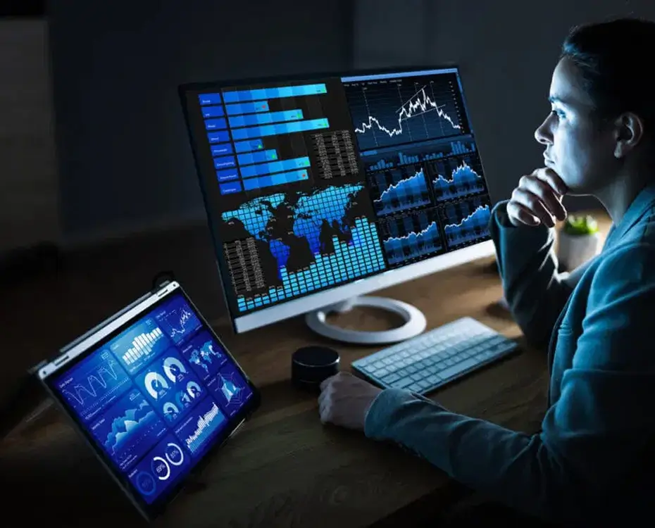 worried business owner staring at different metrics on his computer